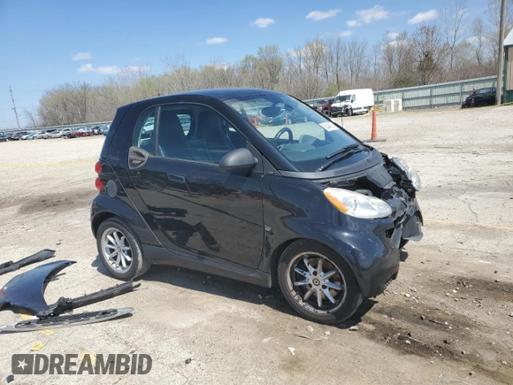 2009 Smart fortwo Pure z VIN WMEEJ31X49K219479, wystawiony jako Copart lot #52446625 z przebiegiem 82 337 mil mil oraz Szkody całkowita. Historia ofert i sprzedaży dostępna na DreamBid. Obrazek 4.