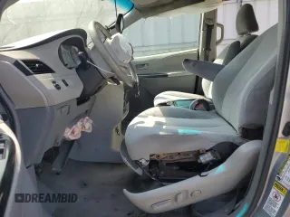 2012 Toyota Sienna LE AAS with VIN 5TDKK3DC2CS207404, listed as a Copart auction lot 62781215 with 200,757 mi miles and Salvage title. Bid and sale history available at DreamBid. Image 7.