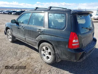2003 Subaru Forester XS with VIN JF1SG65673G743292, listed as a IAAI auction lot 41587235 with 251,523 mi miles. Bid and sale history available at carsss.com. Image 3.