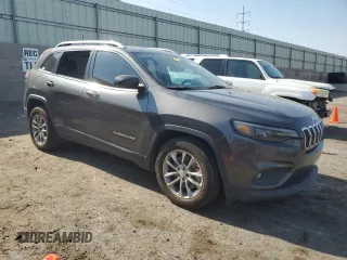 2019 Jeep Cherokee Latitude Plus with VIN 1C4PJLLX4KD248561, listed as a Copart auction lot 57296355 with 123,308 mi miles and Salvage title. Bid and sale history available at DreamBid. Image 4.