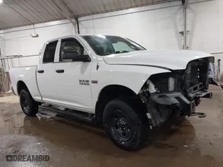 2014 Ram 1500 Express with VIN 1C6RR7FT7ES439142, listed as a IAAI auction lot 41579044 with 157,200 mi miles. Bid and sale history available at carsss.com. Image 1.