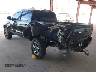 2016 Toyota Tacoma SR with VIN 5TFCZ5AN8GX020900, listed as a IAAI auction lot 41911329 with 133,931 mi miles. Bid and sale history available at carsss.com. Image 3.