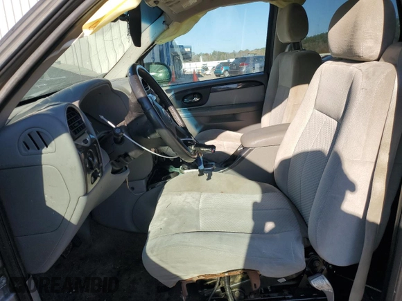 2009 GMC Envoy SLE with VIN 1GKDS33SX92131159, listed as a Copart auction lot 82487404 with 224,391 mi miles and Salvage Title. Bid and sale history available at carsss.com. Image 7.