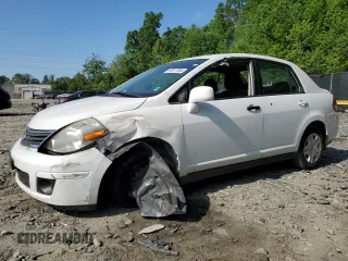 2010 Nissan Versa S with VIN 3N1BC1AP3AL355107, listed as a Copart auction lot 55577565 with 146,452 mi miles and Salvage title. Bid and sale history available at DreamBid. Image 1.