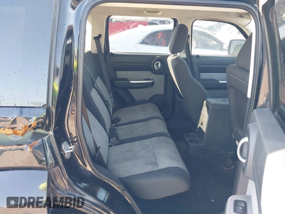 2007 Dodge Nitro SLT with VIN 1D8GT58K97W666680, listed as a IAAI auction lot 41573904 with 171,795 mi miles. Bid and sale history available at carsss.com. Image 8.