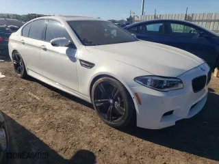2015 BMW M5 with VIN WBSFV9C51FD594308, listed as a Copart auction lot 43259104 with 73,158 mi miles. Bid and sale history available at carsss.com. Image 4.