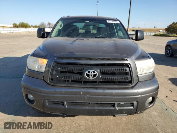 2012 Toyota Tundra 4WD Truck with VIN 5TFDW5F10CX233367, listed as a Copart auction lot 77144064 with 199,361 mi miles and Salvage Title. Bid and sale history available at carsss.com. Image 5.