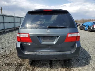 2006 Honda Odyssey EX-L with VIN 5FNRL38706B415413, listed as a Copart auction lot 50725115 with 180,010 mi miles and Salvage Title. Bid and sale history available at carsss.com. Image 6.