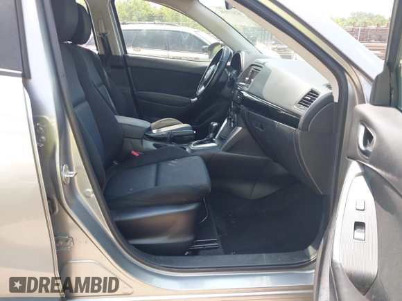2014 Mazda CX-5 Sport with VIN JM3KE4BE9E0411177, listed as a IAAI auction lot 42411938 with 167,709 mi miles and . Bid and sale history available at DreamBid. Image 5.