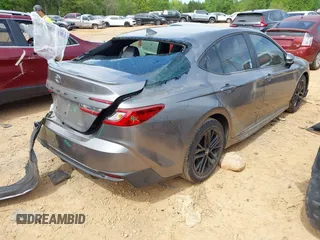 2025 Toyota Camry LE with VIN 4T1DAACK6SU510894, listed as a IAAI auction lot 42048585 with 12,601 mi miles and . Bid and sale history available at DreamBid. Image 4.