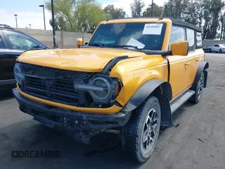 2021 Ford Bronco with VIN 1FMEE5BPXMLA93172, listed as a IAAI auction lot 42109487 with Not Provided miles and . Bid and sale history available at DreamBid. Image 2.