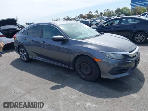 2017 Honda Civic LX with VIN 2HGFC2F52HH566363, listed as a IAAI auction lot 41934807 with 94,063 mi miles and . Bid and sale history available at DreamBid. Image 1.
