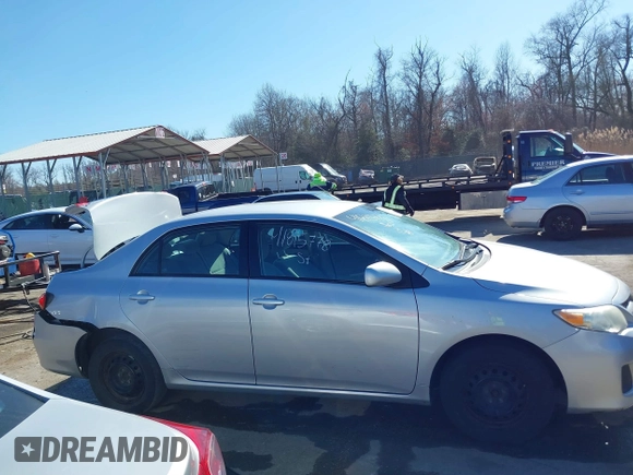 2011 Toyota Corolla L with VIN 2T1BU4EE9BC597358, listed as a IAAI auction lot 41815778 with 142,747 mi miles. Bid and sale history available at carsss.com. Image 13.