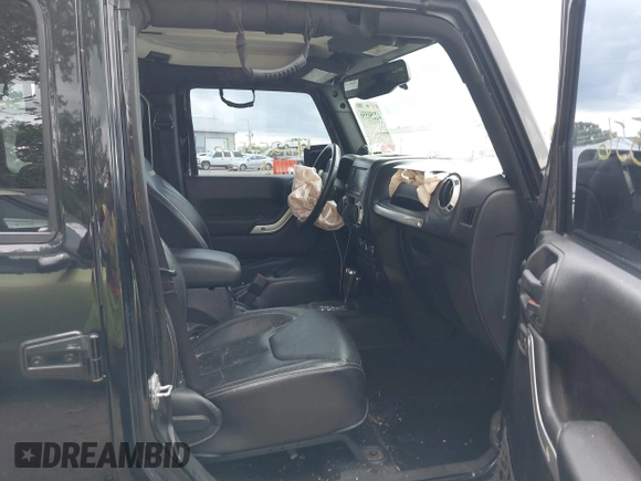 2013 Jeep Wrangler Unlimited Sahara with VIN 1C4BJWEG2DL549864, listed as a IAAI auction lot 42250556 with 231,018 mi miles and . Bid and sale history available at DreamBid. Image 5.