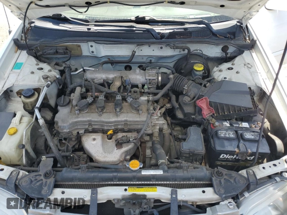 2003 Nissan Sentra XE with VIN 3N1CB51D53L797331, listed as a Copart auction lot 51017035 with 127,530 mi miles and Salvage Title. Bid and sale history available at DreamBid. Image 12.
