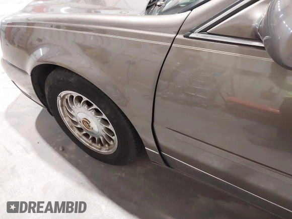 2000 Cadillac DeVille z VIN 1G6KD54Y6YU265538, wystawiony jako IAAI lot #41748755 z przebiegiem 159 676 mil mil oraz . Historia ofert i sprzedaży dostępna na DreamBid. Obrazek 6.