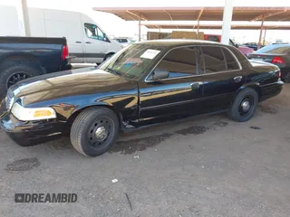 2007 Ford Police Interceptor with VIN 2FAFP71W27X115458, listed as a IAAI auction lot 42566334 with 213,435 mi miles and . Bid and sale history available at DreamBid. Image 2.