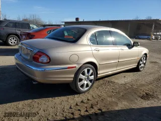 2004 Jaguar X-Type with VIN SAJEA51C14WE01928, listed as a Copart auction lot 80456434 with 32,776 mi miles and Salvage Title. Bid and sale history available at carsss.com. Image 3.