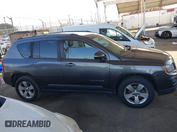 2016 Jeep Compass Latitude with VIN 1C4NJDEB2GD685383, listed as a IAAI auction lot 41968450 with 273,938 mi miles. Bid and sale history available at carsss.com. Image 13.