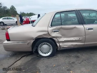 1998 Mercury Grand Marquis LS with VIN 2MEFM75W2WX695255, listed as a IAAI auction lot 41481865 with 177,365 mi miles. Bid and sale history available at carsss.com. Image 6.