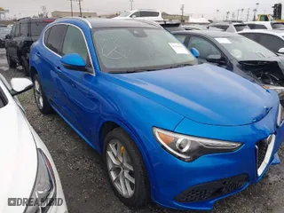 2021 Alfa Romeo Stelvio Ti with VIN ZASPAKBN0M7D18611, listed as a IAAI auction lot 41104626 with 30,188 mi miles. Bid and sale history available at carsss.com. Image 1.
