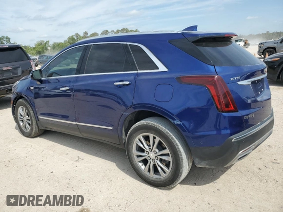 2023 Cadillac XT5 FWD Premium Luxury with VIN 1GYKNCRS3PZ154122, listed as a Copart auction lot 53667425 with 52,279 mi miles and Salvage Title. Bid and sale history available at carsss.com. Image 2.