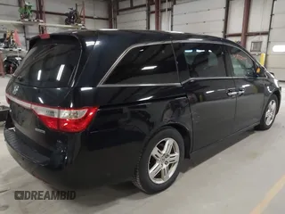 2011 Honda Odyssey Touring с VIN 5FNRL5H9XBB055008, выставлен на аукционе IAAI как лот 41973447 с пробегом 218 762 миль миль и . История ставок и продаж доступна на DreamBid. Изображение 4.