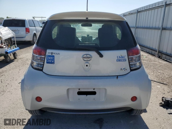 2012 Scion iQ with VIN JTNJJXB06CJ019475, listed as a Copart auction lot 61358615 with 94,194 mi miles and Clean title. Bid and sale history available at DreamBid. Image 6.