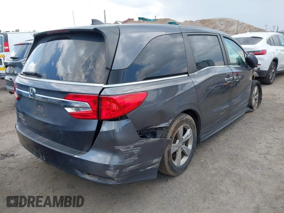 2020 Honda Odyssey EX with VIN 5FNRL6H54LB025555, listed as a IAAI auction lot 42512480 with 95,425 mi miles and . Bid and sale history available at DreamBid. Image 4.