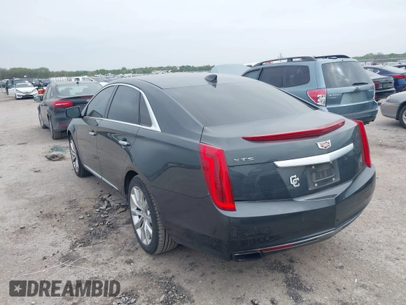 2017 Cadillac XTS Luxury with VIN 2G61M5S35H9143656, listed as a IAAI auction lot 41929023 with 141,033 mi miles and . Bid and sale history available at DreamBid. Image 3.