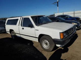 1990 Mitsubishi Mighty Max z VIN JA7FL24W3LP007688, wystawiony jako Copart lot #42651005 z przebiegiem 265 379 mil mil oraz Tytuł czysty. Historia ofert i sprzedaży dostępna na DreamBid. Obrazek 4.