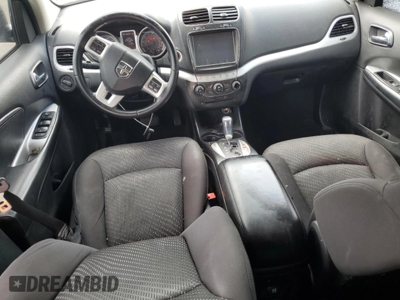 2012 Dodge Journey SXT with VIN 3C4PDCCG4CT243492, listed as a Copart auction lot 59908485 with 319,175 mi miles and Salvage title. Bid and sale history available at DreamBid. Image 8.