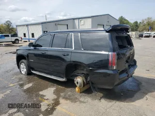 2015 GMC Yukon SLT with VIN 1GKS1BKC0FR113013, listed as a Copart auction lot 49821495 with 294,596 mi miles and Salvage Title. Bid and sale history available at carsss.com. Image 2.
