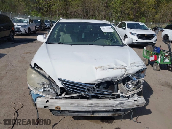 2005 Toyota Camry LE with VIN JTDBF30K650165746, listed as a IAAI auction lot 42066944 with 205,829 mi miles and . Bid and sale history available at DreamBid. Image 12.