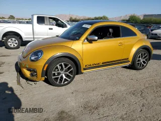 2018 Volkswagen Beetle Dune with VIN 3VWSD7AT6JM703211, listed as a Copart auction lot 70434054 with Not Provided miles and Salvage Title. Bid and sale history available at DreamBid. Image 1.