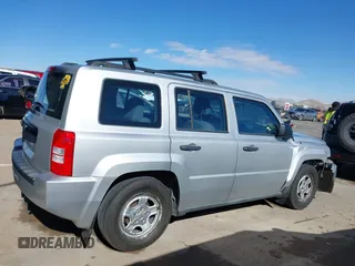 2010 Jeep Patriot Sport with VIN 1J4NT2GB1AD519675, listed as a IAAI auction lot 41321426 with 239,093 mi miles. Bid and sale history available at carsss.com. Image 13.