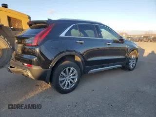 2022 Cadillac XT4 AWD Premium Luxury with VIN 1GYFZDR45NF109999, listed as a Copart auction lot 84618914 with 66,697 mi miles and Clean title. Bid and sale history available at DreamBid. Image 3.