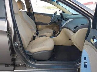2012 Hyundai Accent GLS with VIN KMHCU4AE4CU097425, listed as a IAAI auction lot 42052740 with 244,705 mi miles. Bid and sale history available at carsss.com. Image 5.