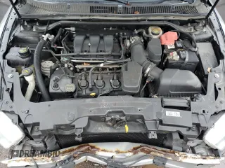 2013 Ford Taurus SEL z VIN 1FAHP2E87DG104349, wystawiony jako Copart lot #57143135 z przebiegiem 129 927 mil mil oraz Szkoda całkowita • Salvage title. Historia ofert i sprzedaży dostępna na DreamBid. Obrazek 11.