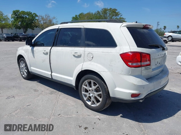 2014 Dodge Journey SXT with VIN 3C4PDCBG4ET235848, listed as a IAAI auction lot 41824155 with 48,691 mi miles and . Bid and sale history available at DreamBid. Image 3.