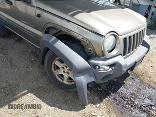 2003 Jeep Liberty Sport z VIN 1J4GK48K63W602709, wystawiony jako IAAI lot #42176496 z przebiegiem 151 397 mil mil oraz . Historia ofert i sprzedaży dostępna na DreamBid. Obrazek 6.