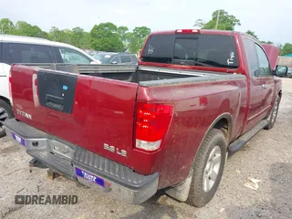 2004 Nissan Titan SE with VIN 1N6AA06A94N545539, listed as a IAAI auction lot 42036468 with 212,269 mi miles. Bid and sale history available at carsss.com. Image 4.