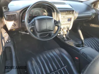 2000 Chevrolet Camaro Z28 z VIN 2G1FP22G3Y2123001, wystawiony jako Copart lot #85730994 z przebiegiem 32 579 mil mil oraz Szkoda całkowita • Salvage title. Historia ofert i sprzedaży dostępna na DreamBid. Obrazek 8.