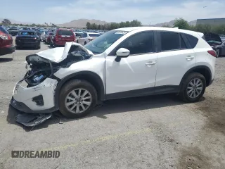 2016 Mazda CX-5 Touring z VIN JM3KE2CY8G0874914, wystawiony jako Copart lot #56730625 z przebiegiem 65 765 mil mil oraz Szkoda całkowita • Salvage title. Historia ofert i sprzedaży dostępna na DreamBid. Obrazek 1.