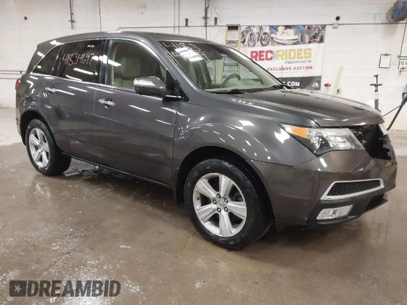 2010 Acura MDX Technology Pkg with VIN 2HNYD2H6XAH515333, listed as a IAAI auction lot 41834679 with 128,224 mi miles. Bid and sale history available at carsss.com. Image 1.