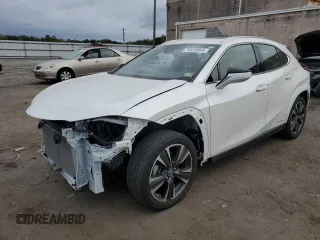 2022 Lexus UX 250h с VIN JTHP9JBHXN2060522, выставлен на аукционе Copart как лот 70833054 с пробегом 17 154 миль миль и Списание • Salvage title. История ставок и продаж доступна на DreamBid. Изображение 1.