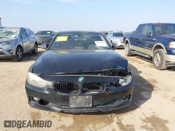 2013 BMW 3 Series 328i with VIN WBA3C1C51DF440679, listed as a IAAI auction lot 41533587 with 184,812 mi miles. Bid and sale history available at carsss.com. Image 12.