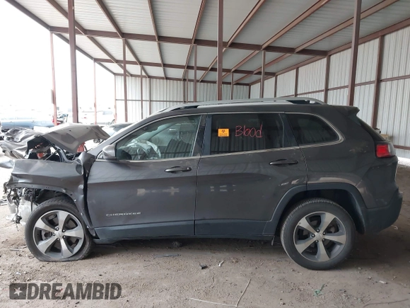 2020 Jeep Cherokee Limited z VIN 1C4PJLDBXLD587216, wystawiony jako IAAI lot #41941781 z przebiegiem Nie podano mil oraz . Historia ofert i sprzedaży dostępna na DreamBid. Obrazek 14.