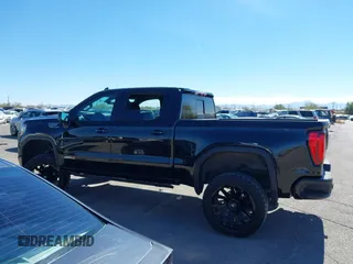 2021 GMC Sierra 1500 AT4 with VIN 3GTP9EED5MG206008, listed as a IAAI auction lot 41665423 with 61,685 mi miles. Bid and sale history available at carsss.com. Image 15.
