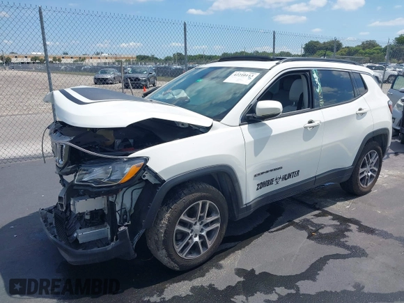 2019 Jeep Compass Latitude with VIN 3C4NJCBB3KT832196, listed as a IAAI auction lot 42210113 with 70,241 mi miles and . Bid and sale history available at DreamBid. Image 2.